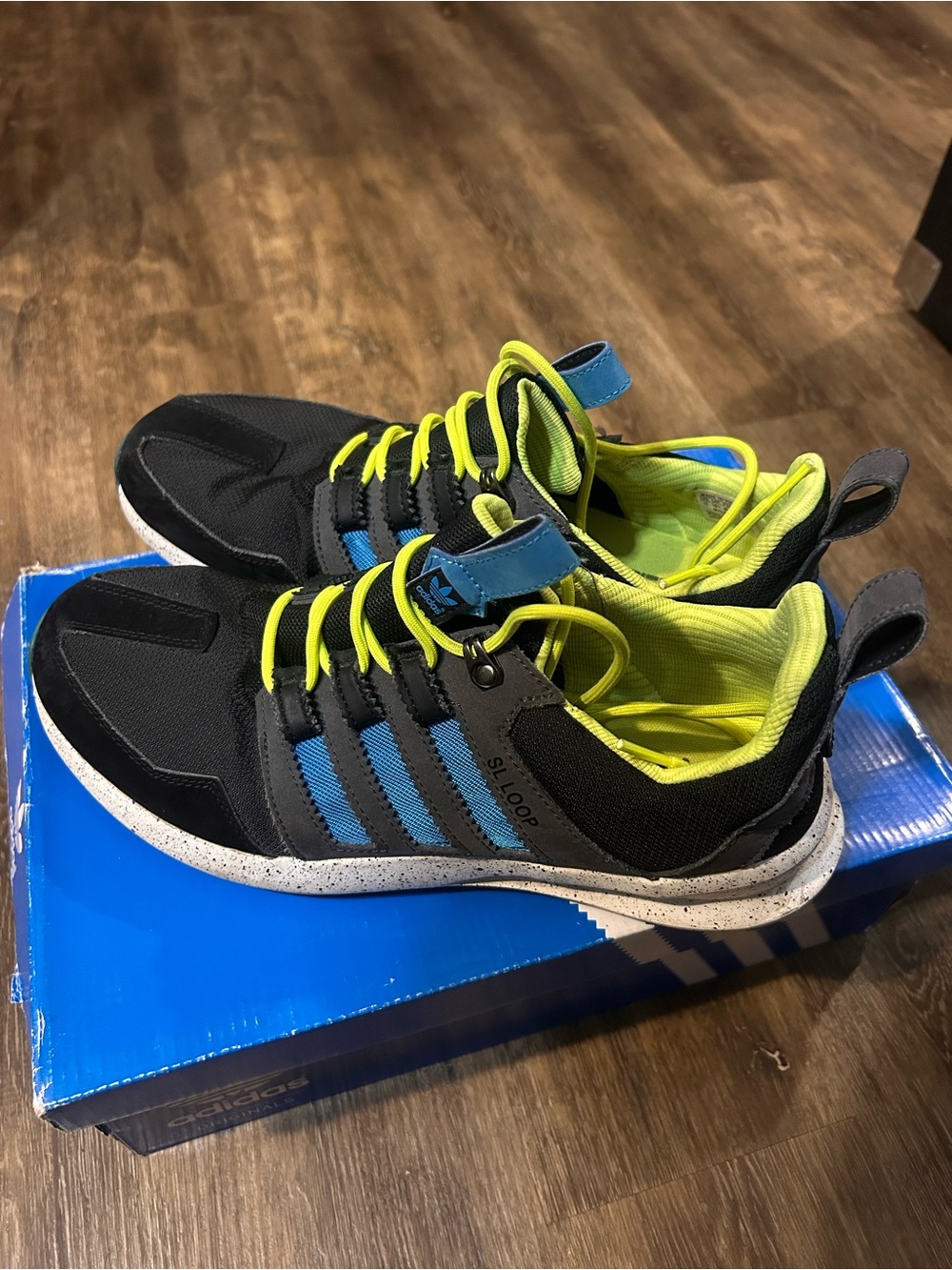adidas Men's Black Athletic Sneakers with Blue Stripes & Neon Yellow Accents